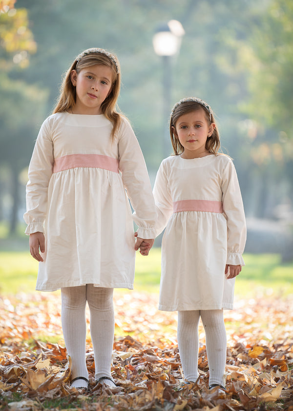 Vestido blanco cintón rosado